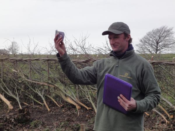 Tony Ridd presenting a prize at the 2010 Isle of Wight Hedgelaying Competition